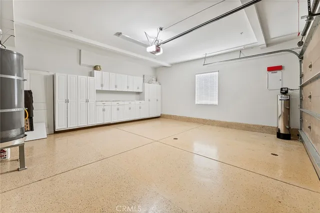 a view of a porch with a table and chairs
