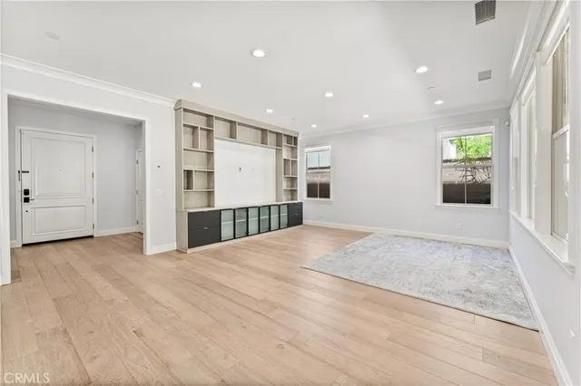 a view of kitchen with wooden floor