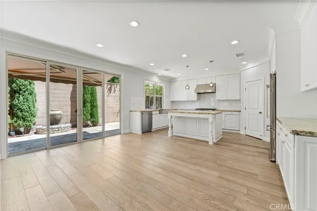 a view of livingroom with hardwood floor and hallway
