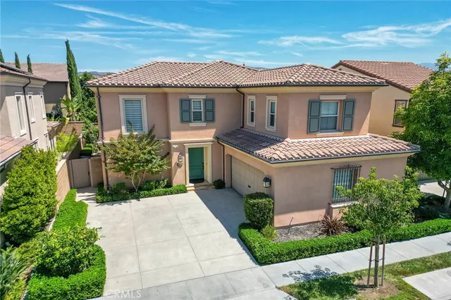 a front view of a building with garden