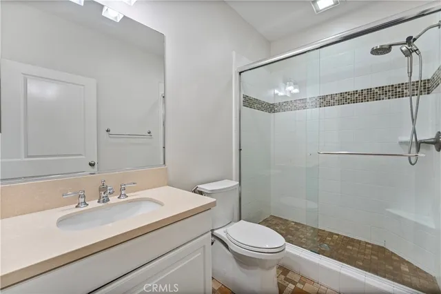 wooden floor with white walls