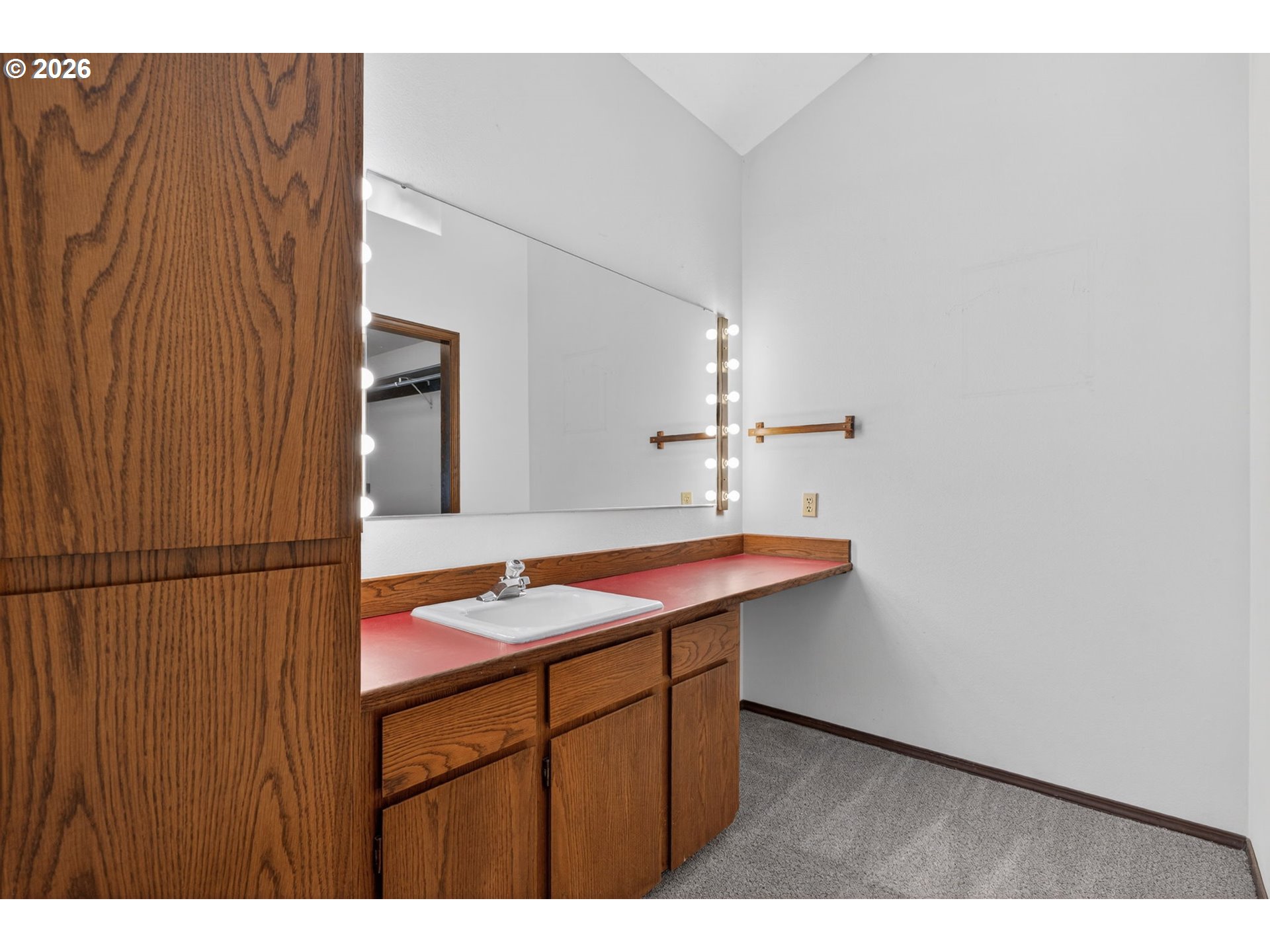 5205 Southwest 153rd Avenue Beaverton, OR 97007 - Photo 22 of 47 a bathroom with a sink and a mirror