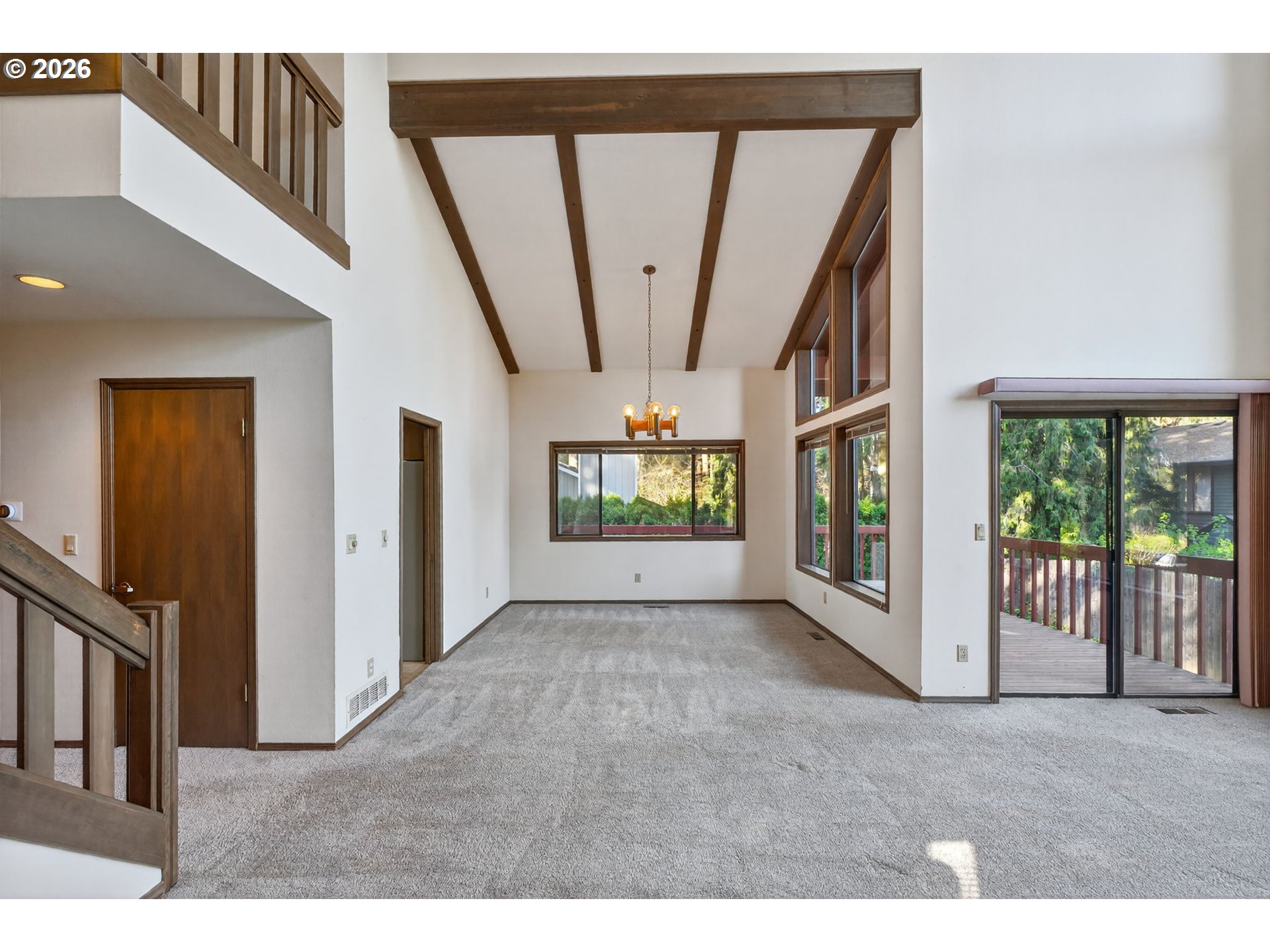 5205 Southwest 153rd Avenue Beaverton, OR 97007 - Photo 26 of 47 a view interior of a house with wooden floor and windows