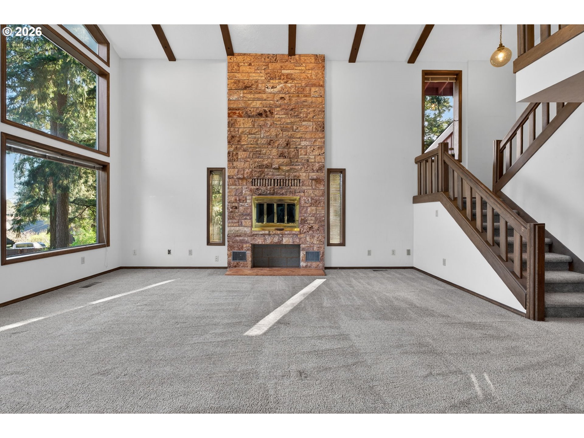 5205 Southwest 153rd Avenue Beaverton, OR 97007 - Photo 3 of 47 a view of an empty room with staircase