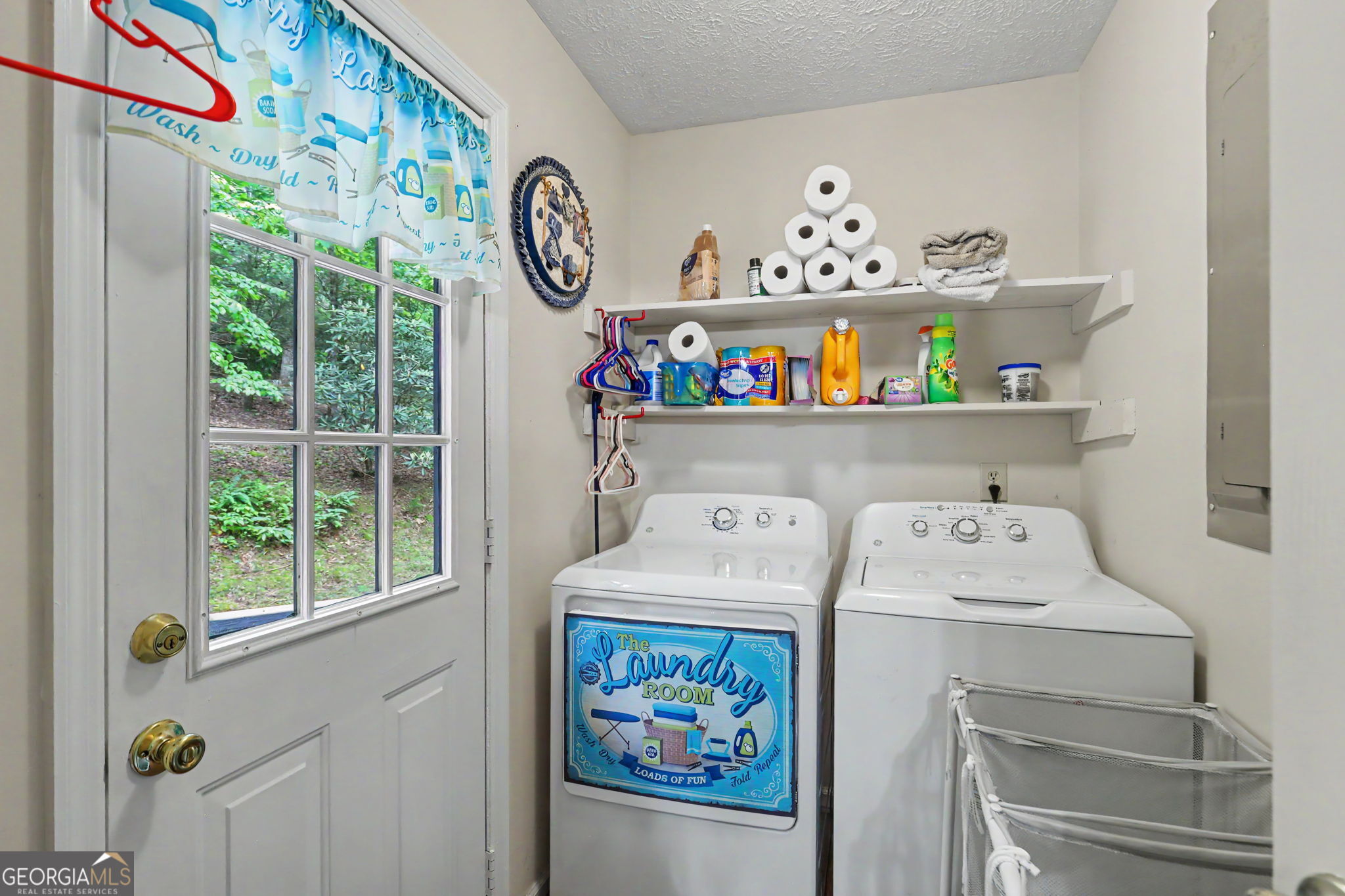 325 Walnut Mountain Road Rabun Gap, GA 30568 - Photo 20 of 38 a utility room with dryer and washer