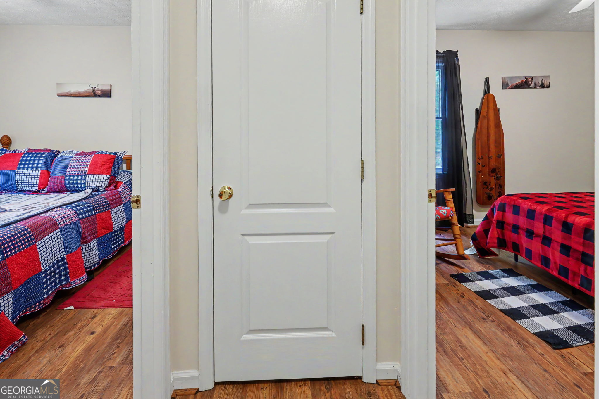 325 Walnut Mountain Road Rabun Gap, GA 30568 - Photo 24 of 38 a view of walk in closet with clothes and shoes