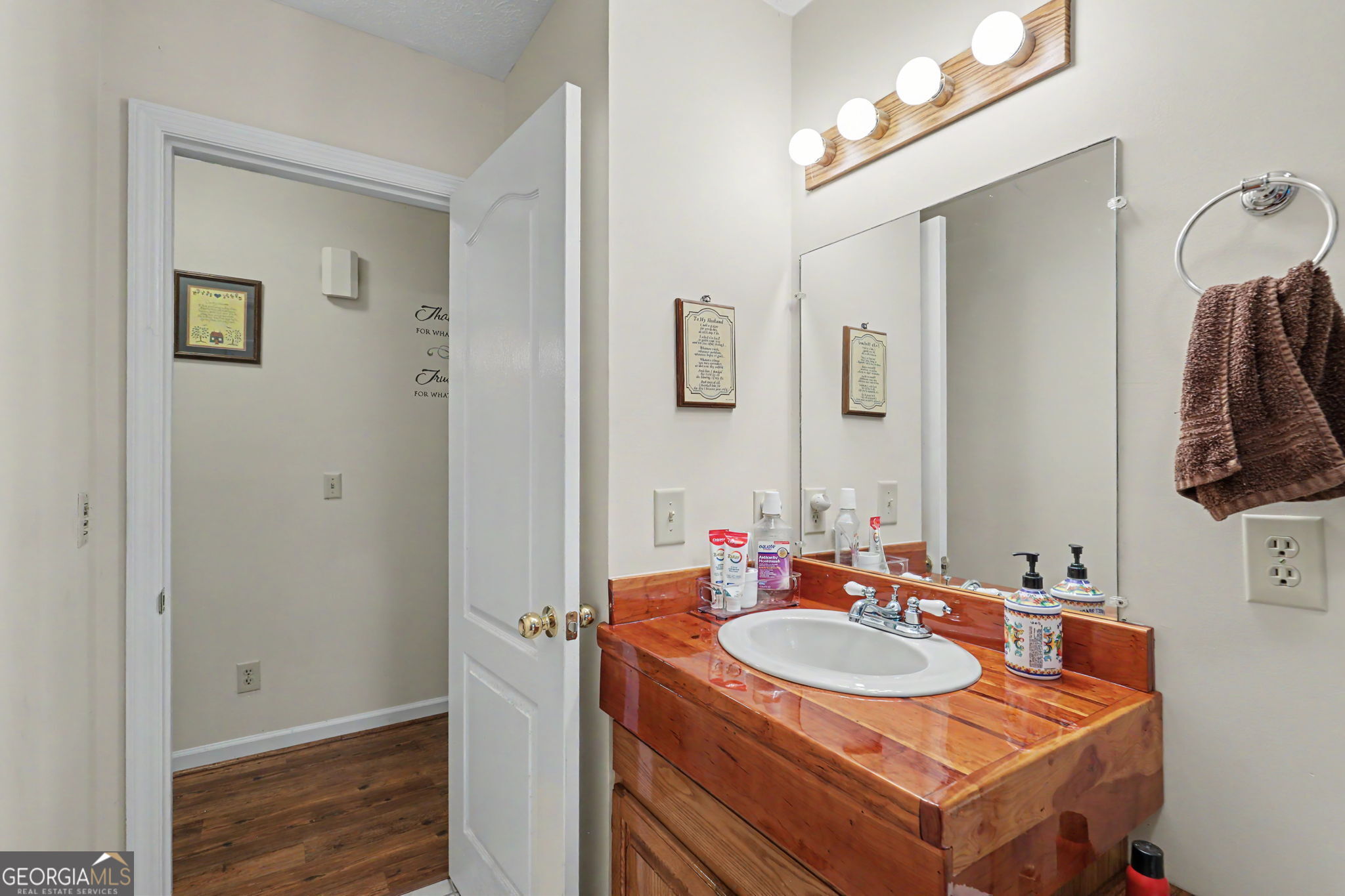 325 Walnut Mountain Road Rabun Gap, GA 30568 - Photo 30 of 38 a bathroom with a sink and a mirror