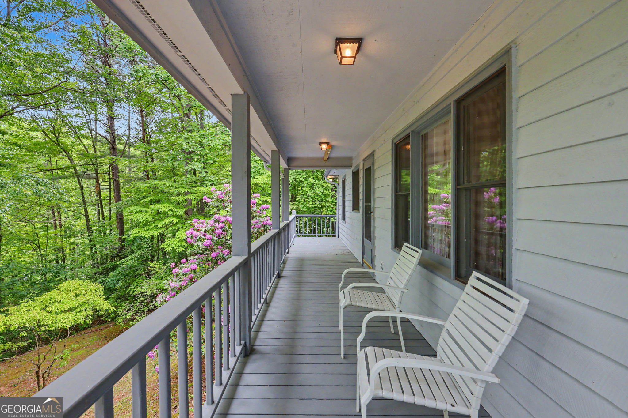 325 Walnut Mountain Road Rabun Gap, GA 30568 - Photo 8 of 38 a view of balcony with furniture