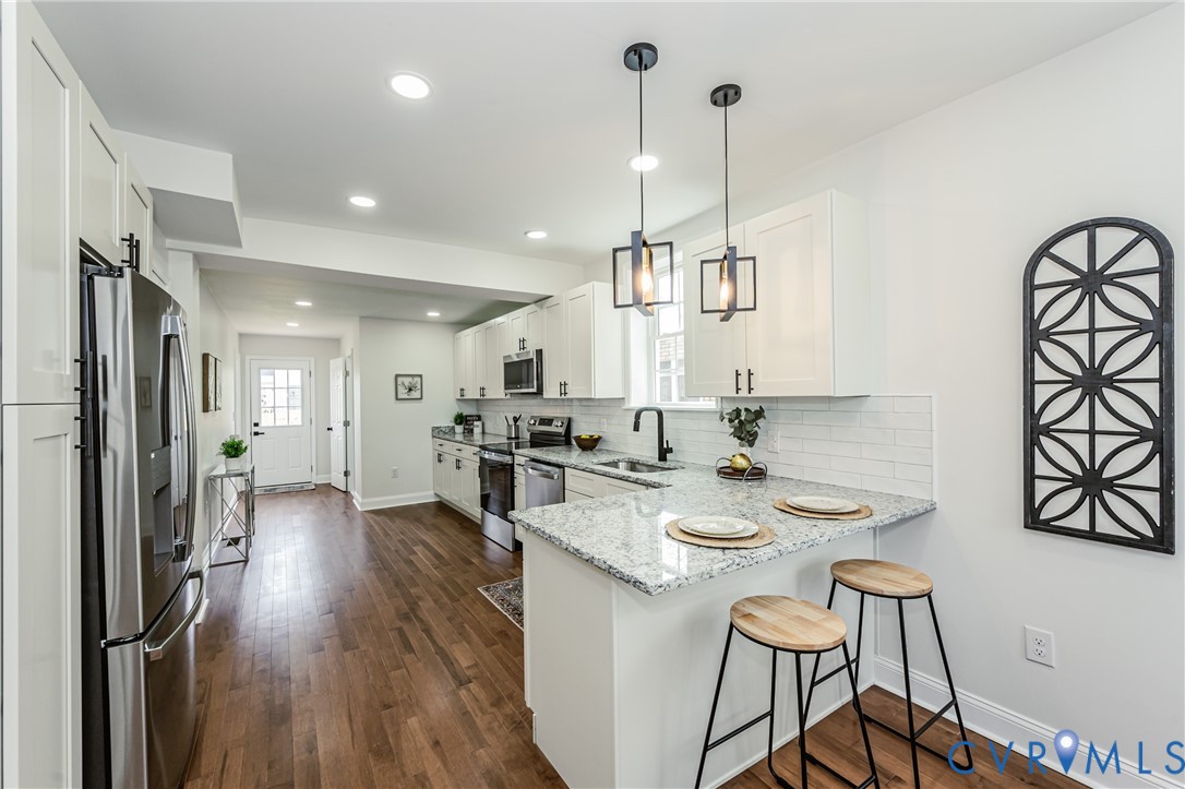 1400 Decatur Street Richmond, VA 23224 - Photo 19 of 49 a view of a kitchen and dining room