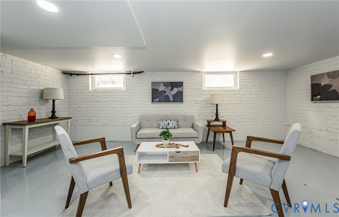 1400 Decatur Street Richmond, VA 23224 - Photo 33 of 49 a living room with furniture and a flat screen tv