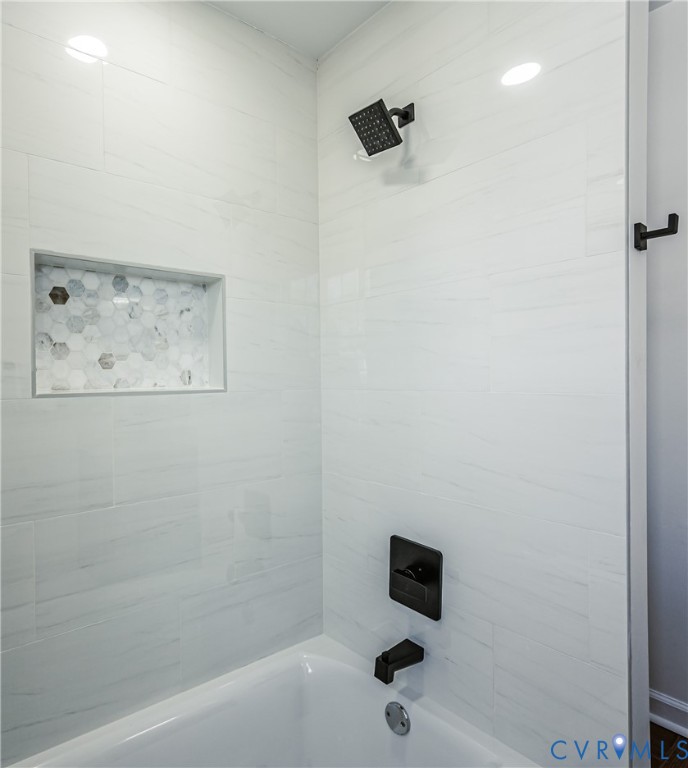 1400 Decatur Street Richmond, VA 23224 - Photo 40 of 49 a bathroom with a bathtub and a shower
