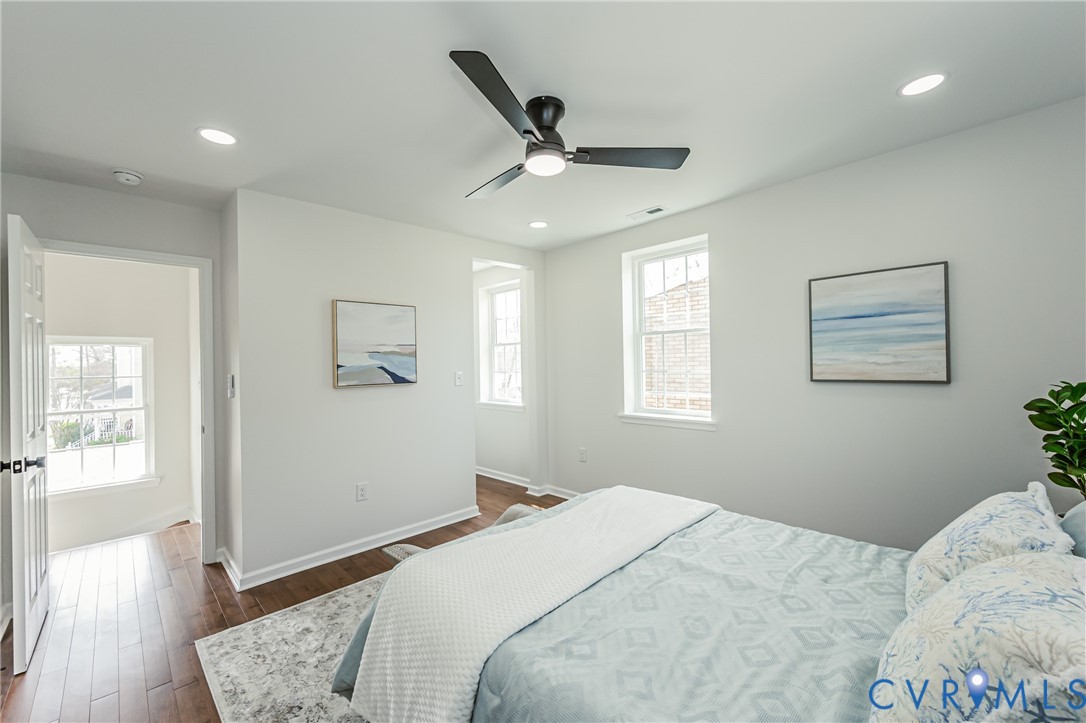 1400 Decatur Street Richmond, VA 23224 - Photo 42 of 49 a bedroom with bed and wooden floor