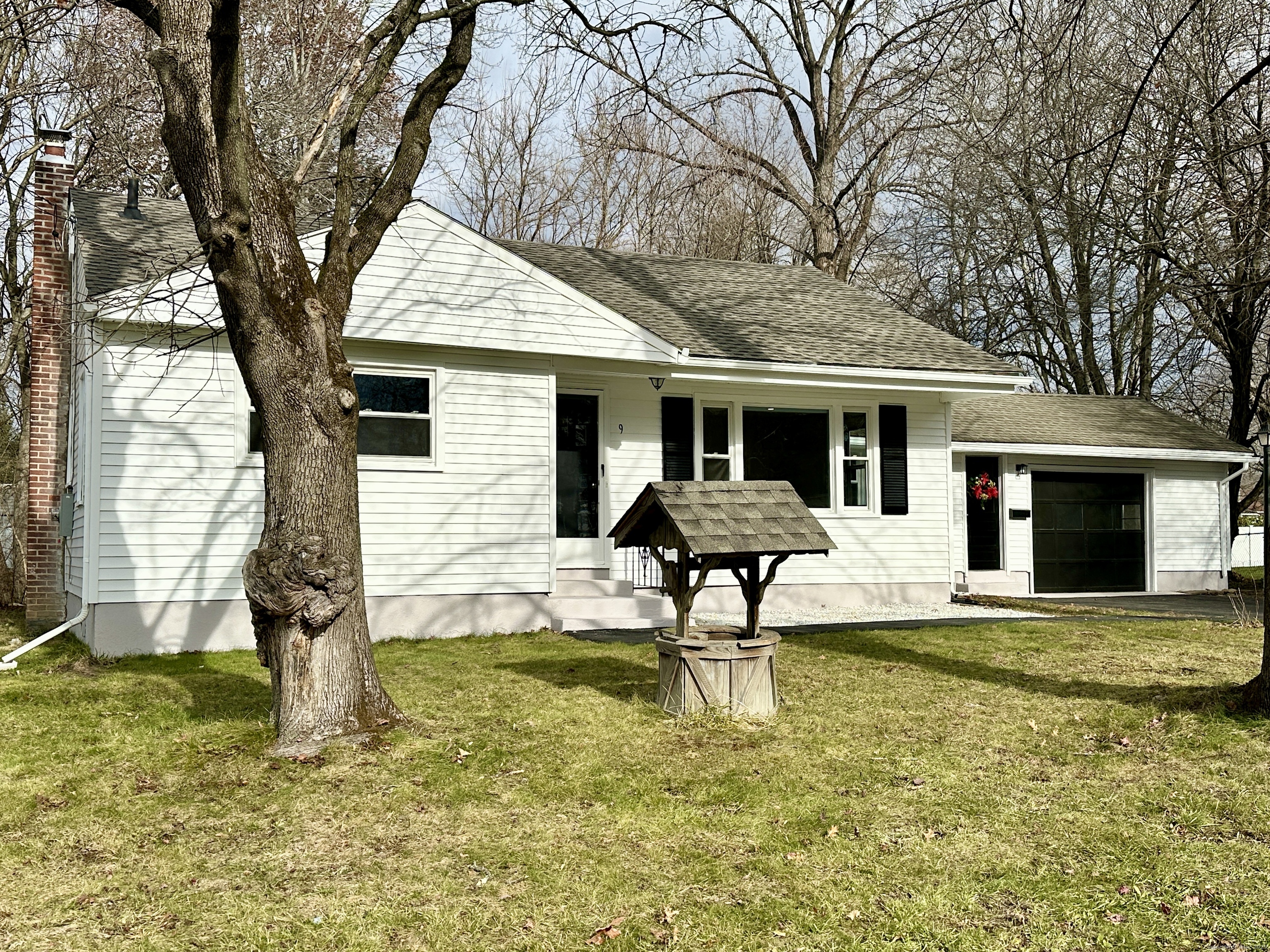 9 Eleanor Road Enfield, CT 06082 - Photo 2 of 32 a front view of house with yard