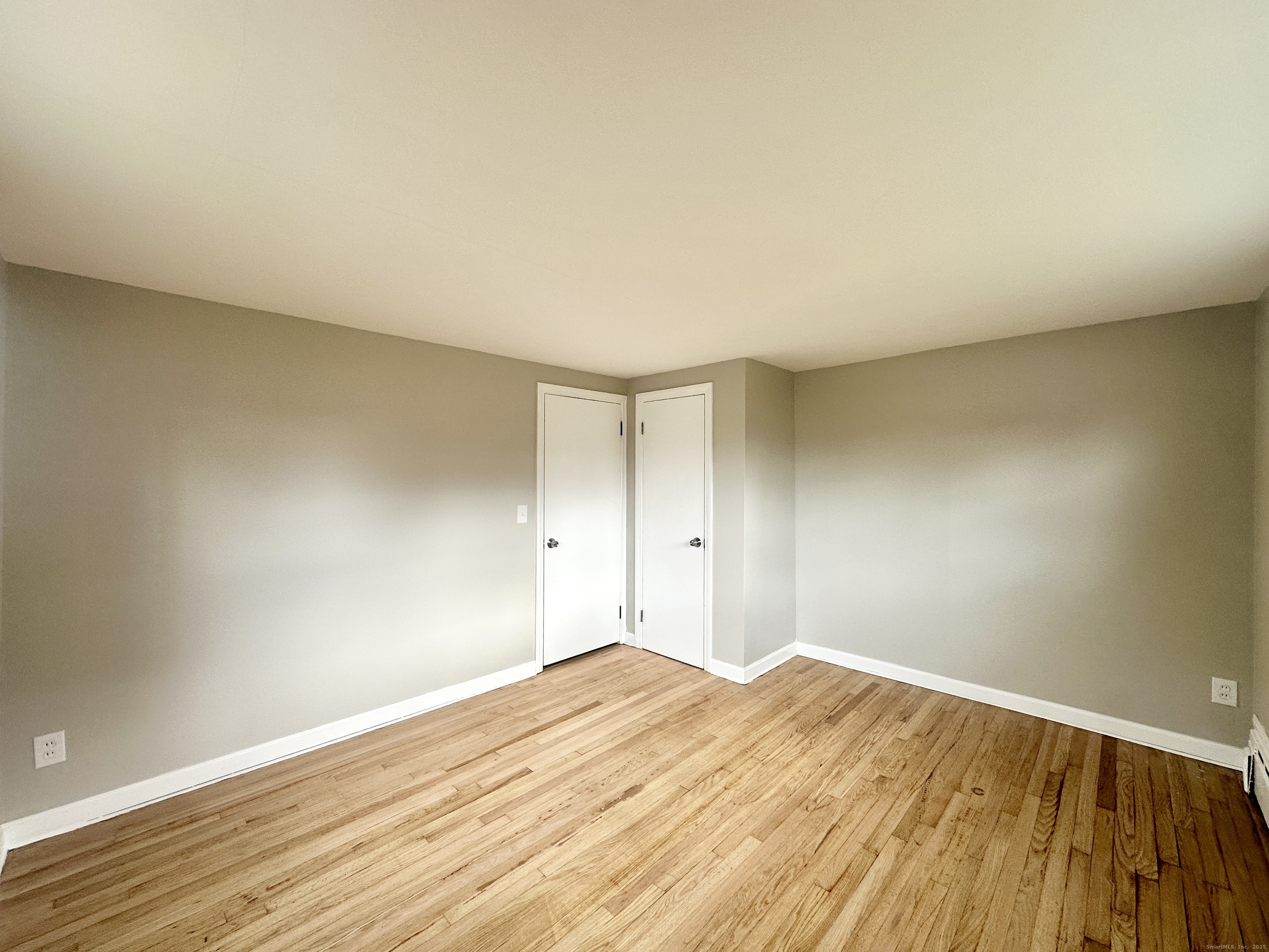 9 Eleanor Road Enfield, CT 06082 - Photo 27 of 32 a big room with wooden floor