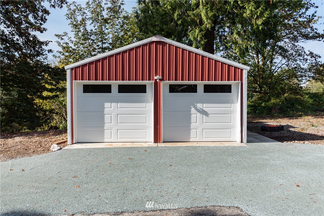 14425 Westwick Road Snohomish, WA 98290 - Photo 2 of 25 a view of a house with a yard