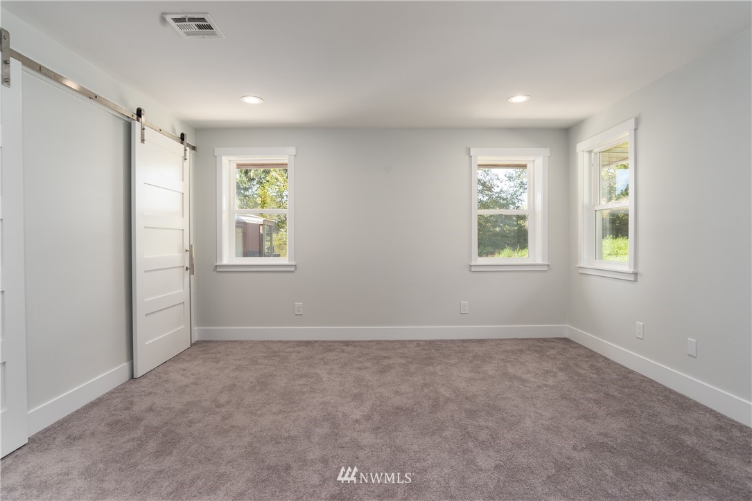 14425 Westwick Road Snohomish, WA 98290 - Photo 15 of 25 a view of an empty room with a window