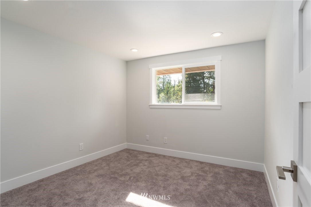 14425 Westwick Road Snohomish, WA 98290 - Photo 21 of 25 an empty room with windows