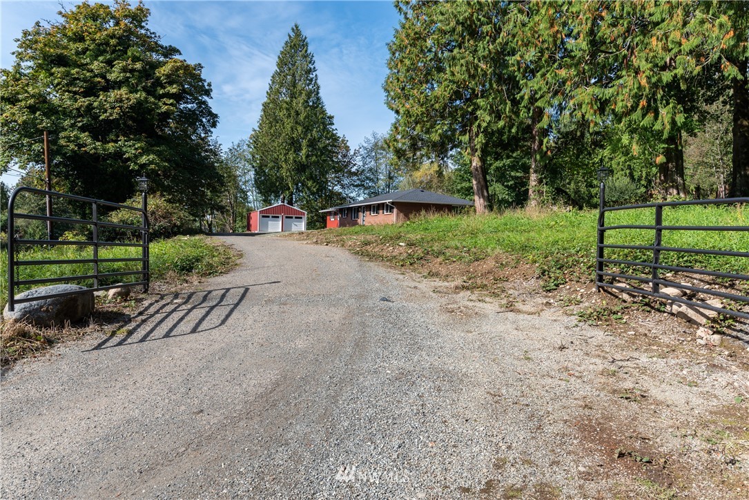 14425 Westwick Road Snohomish, WA 98290 - Photo 25 of 25 a view of a park with large trees