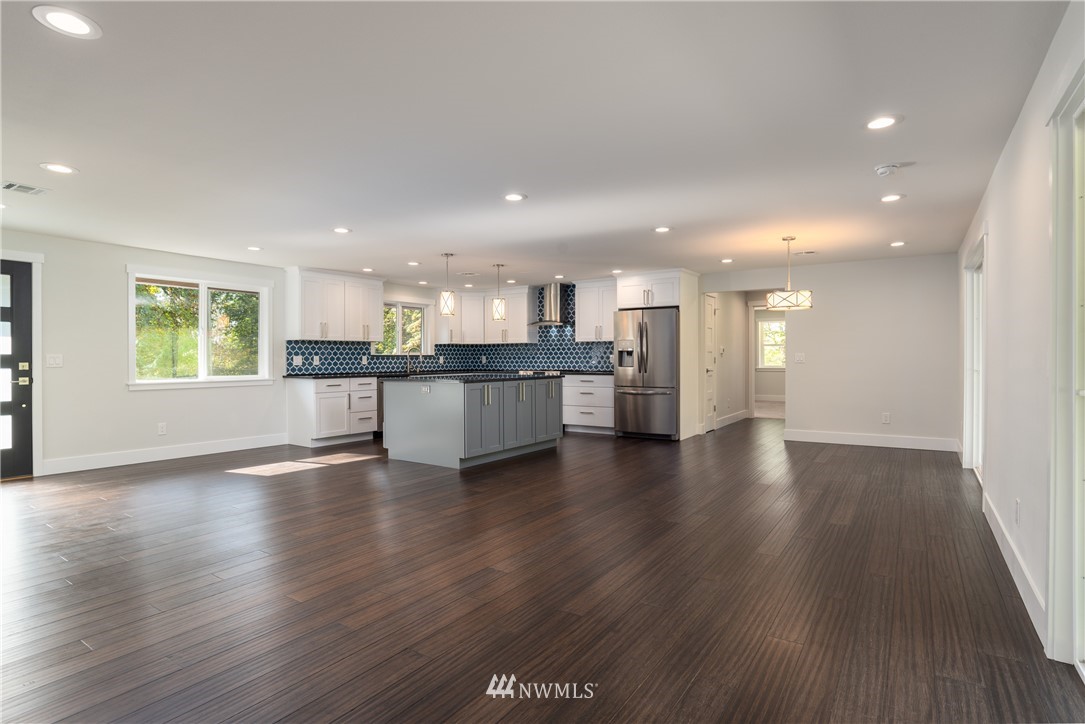 14425 Westwick Road Snohomish, WA 98290 - Photo 6 of 25 a view of kitchen with wooden floor and windows
