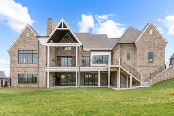 a big house with a big yard and more windows