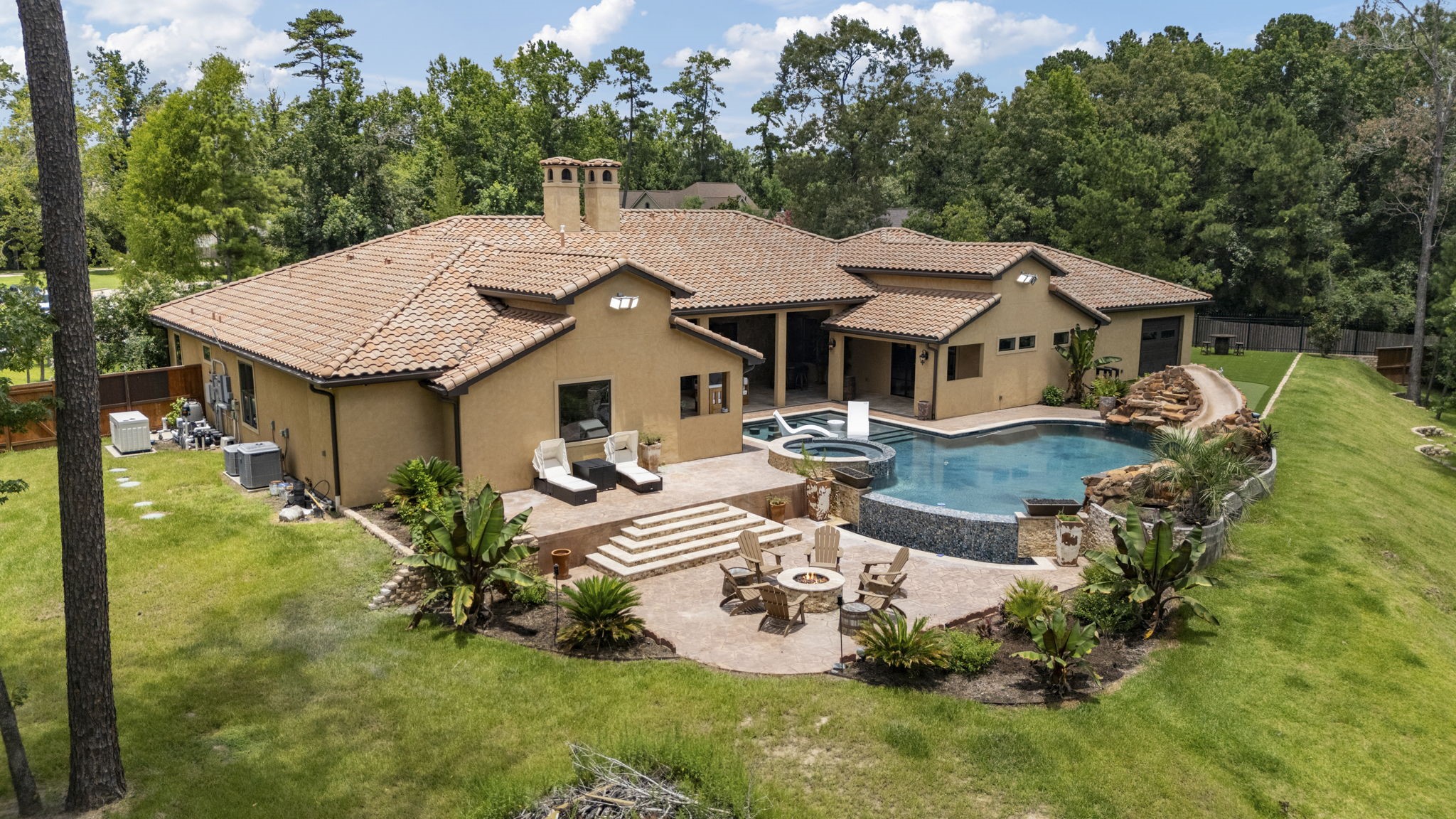 4322 Maple Rapids Court Spring, TX 77386 - Photo 11 of 48 Arieal view shows additional outdoor living space with firepit. All pool equipment and whole house generator to your left.
