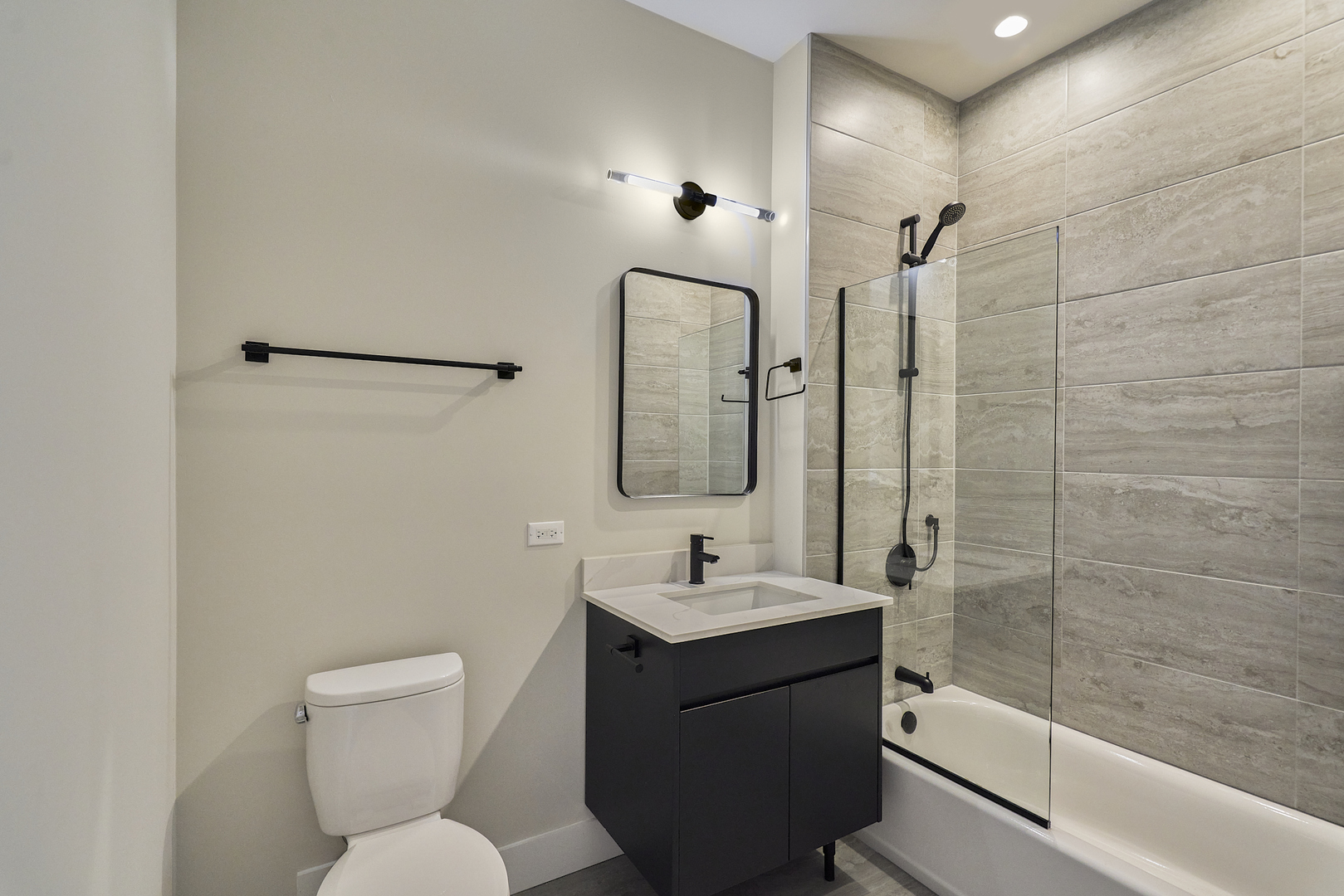 503 East Pershing Road, Unit 201 Chicago, IL 60653 - Photo 23 of 29 a bathroom with a sink toilet and shower