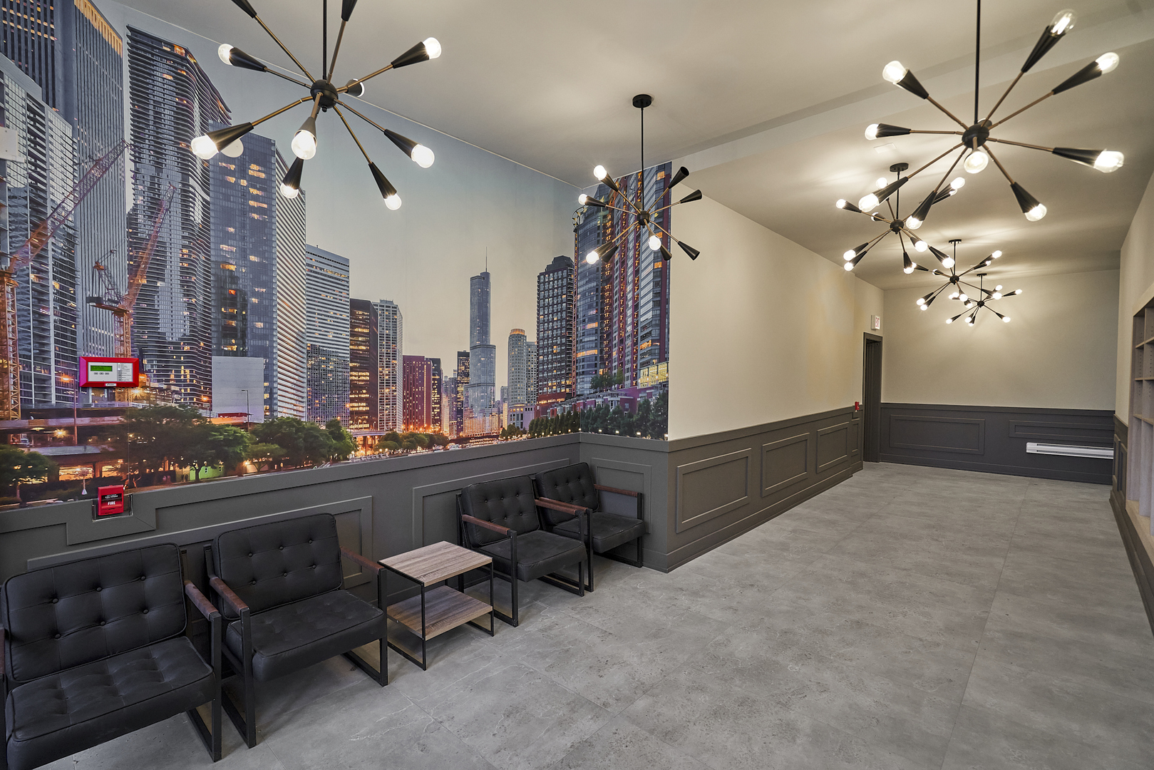 503 East Pershing Road, Unit 201 Chicago, IL 60653 - Photo 3 of 29 a living room with patio furniture and a chandelier