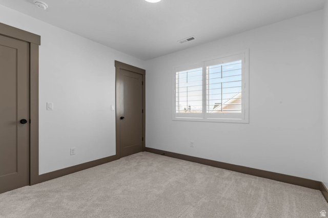 2724 Mt Jordan Road Sandy, UT 84092 - Photo 28 of 33 Unfurnished bedroom featuring carpet and a closet