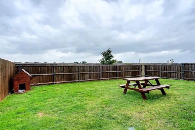 a view of a bench in the garden