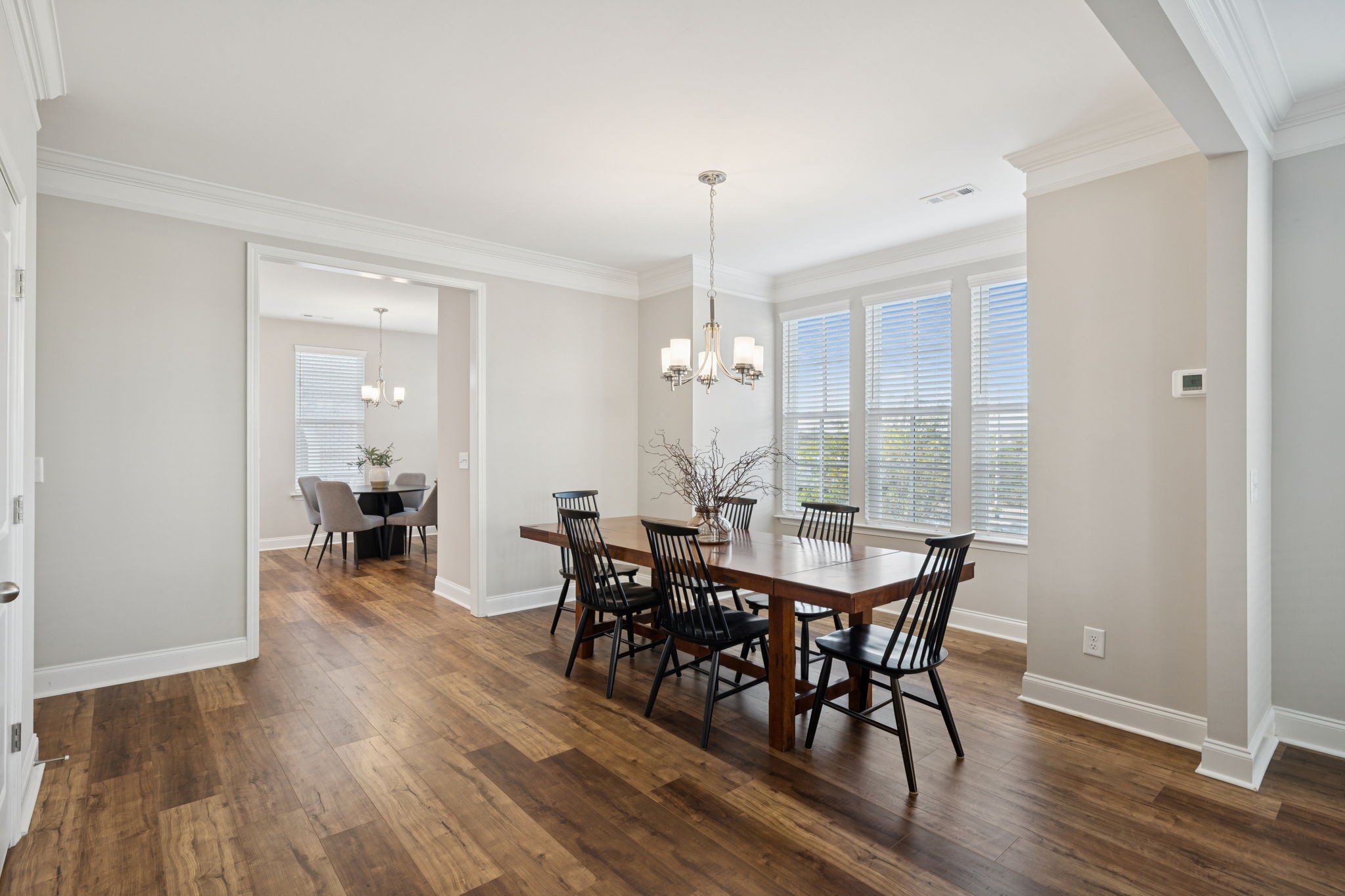 185 Burkitt Commons Avenue Nolensville, TN 37135 - Photo 11 of 46 a view of a dining room with furniture window and wooden floor
