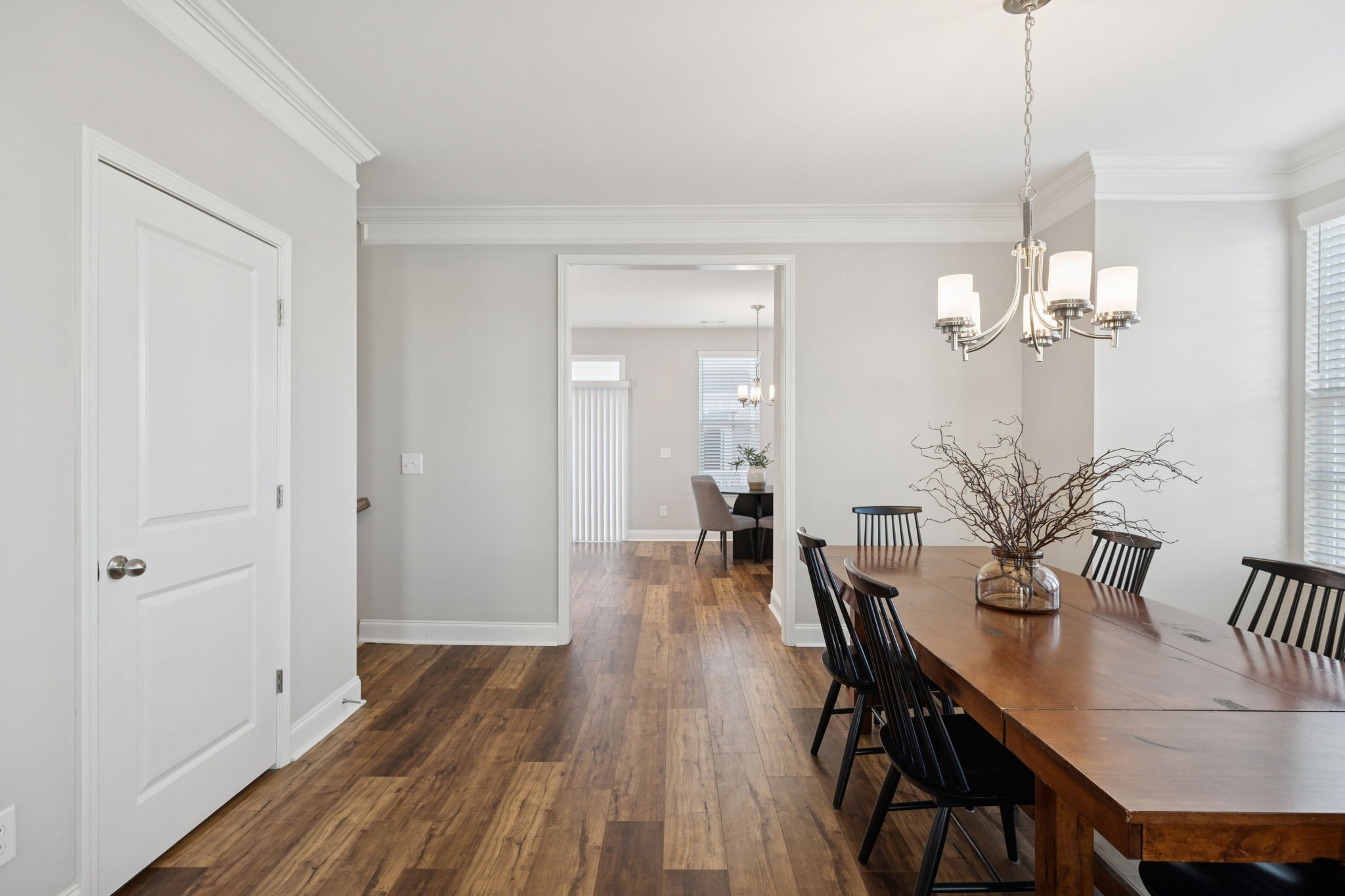 185 Burkitt Commons Avenue Nolensville, TN 37135 - Photo 12 of 46 a view of a dining room with furniture and wooden floor