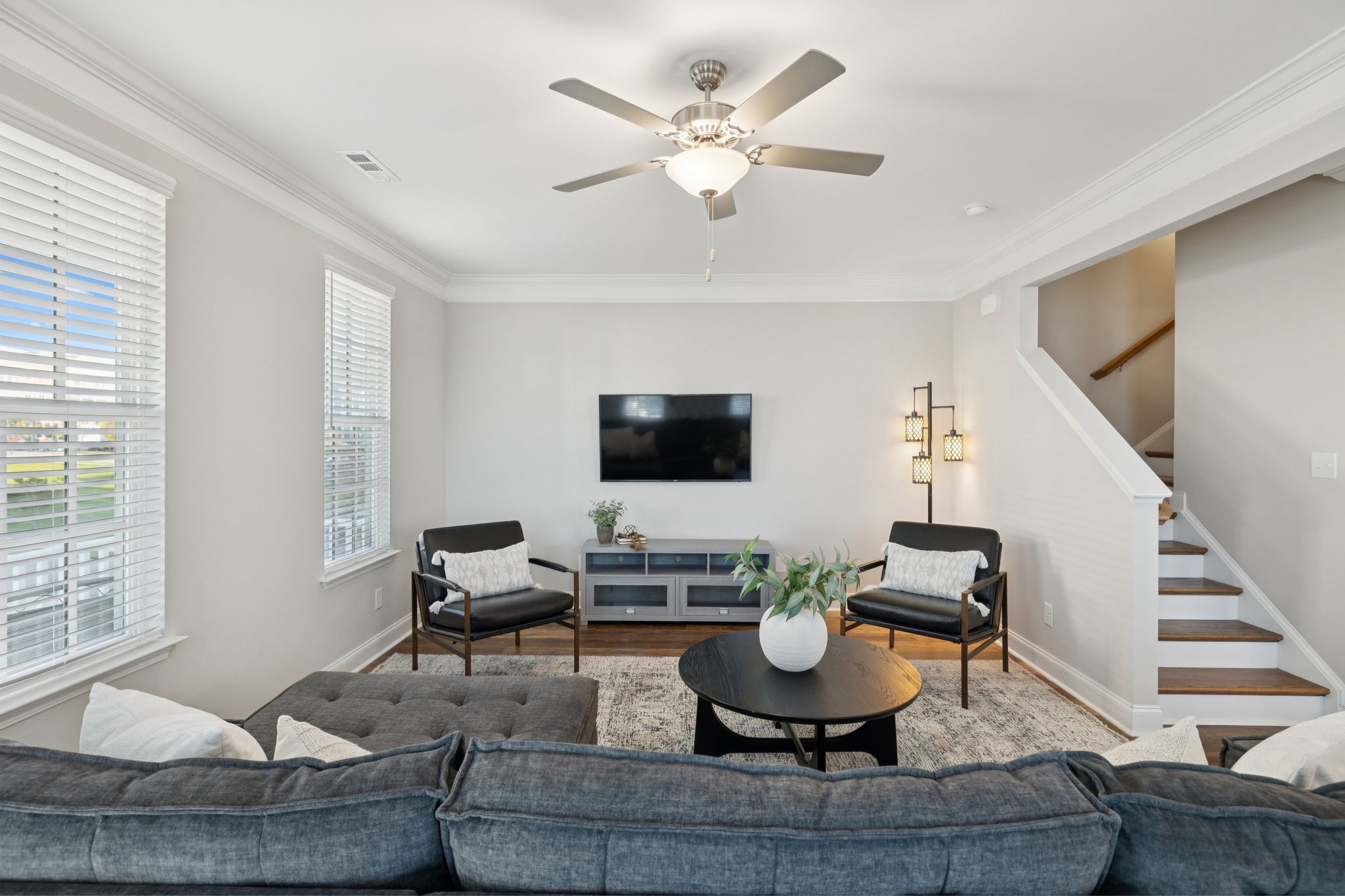 185 Burkitt Commons Avenue Nolensville, TN 37135 - Photo 14 of 46 a living room with couches a coffee table and a piano with wooden floor