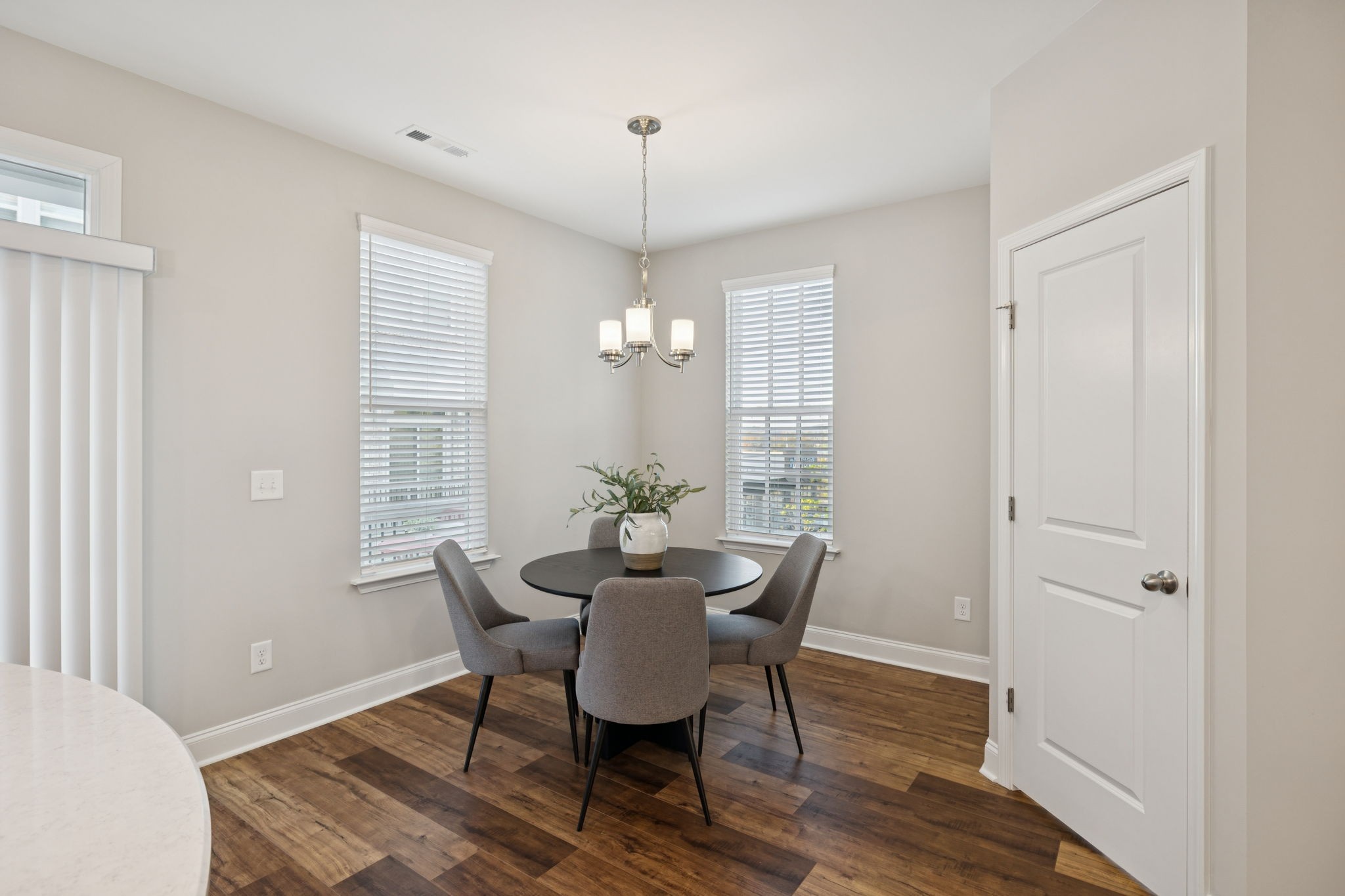 185 Burkitt Commons Avenue Nolensville, TN 37135 - Photo 25 of 46 a view of a dining room with furniture window and wooden floor