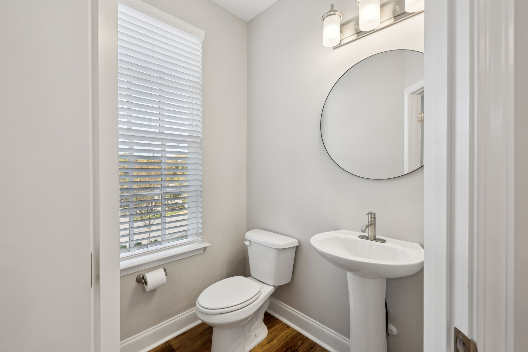 185 Burkitt Commons Avenue Nolensville, TN 37135 - Photo 26 of 46 a bathroom with a toilet sink and mirror