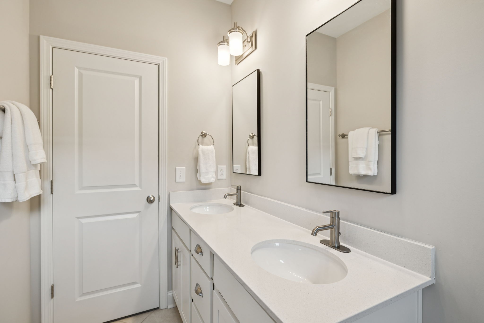 185 Burkitt Commons Avenue Nolensville, TN 37135 - Photo 30 of 46 a bathroom with 2 sink and a mirror