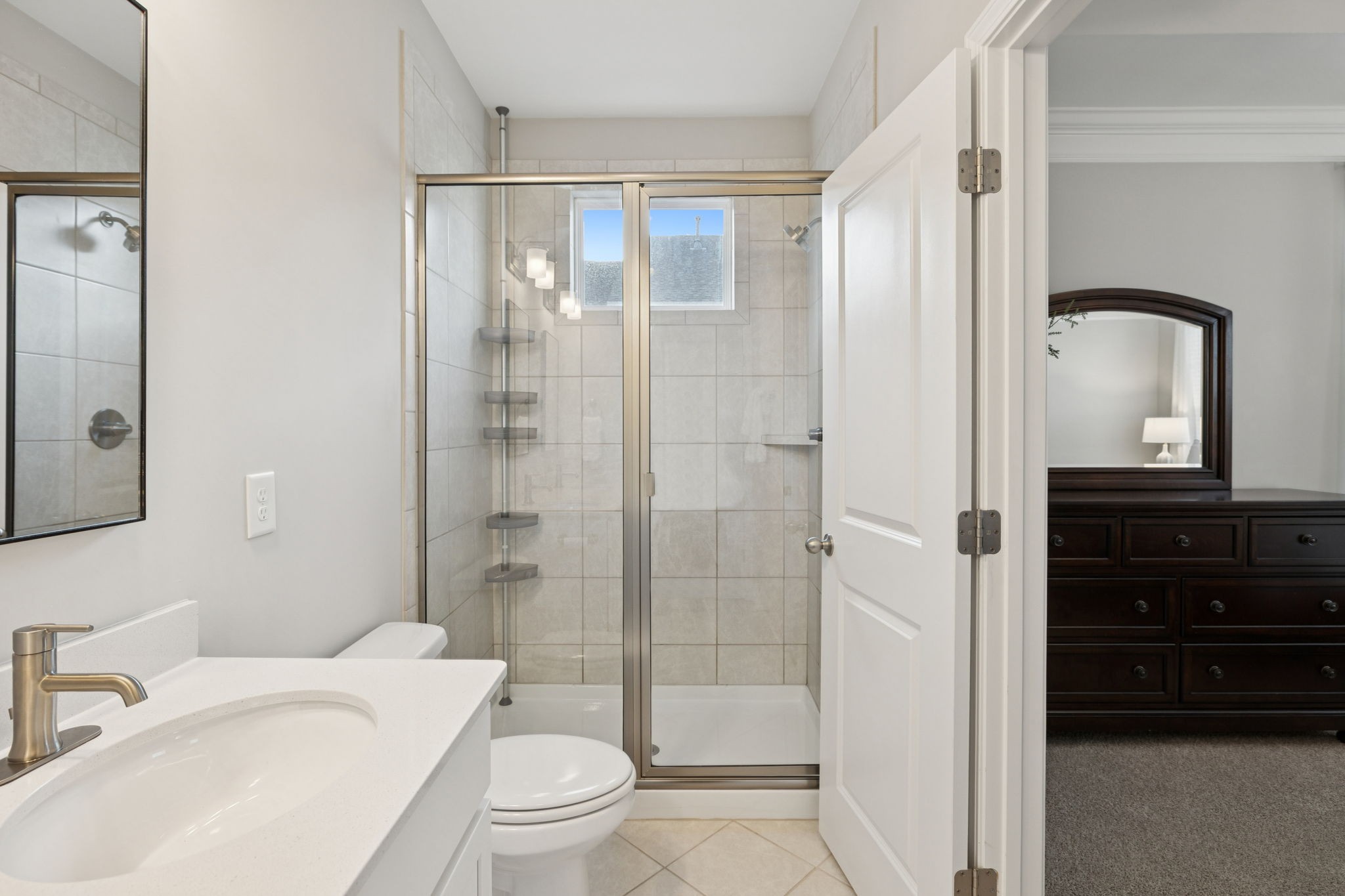 185 Burkitt Commons Avenue Nolensville, TN 37135 - Photo 31 of 46 a bathroom with a toilet a sink and a mirror