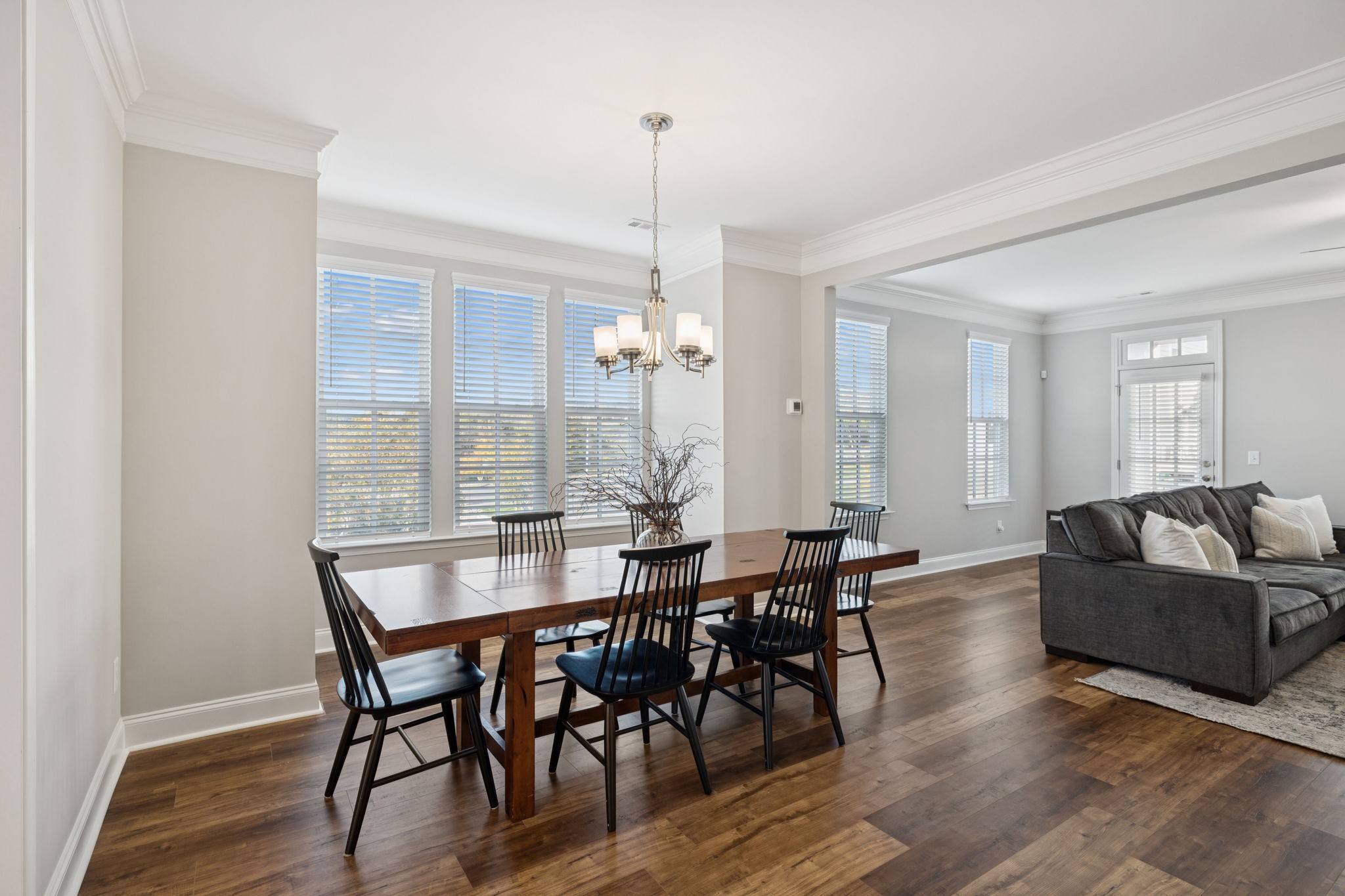 185 Burkitt Commons Avenue Nolensville, TN 37135 - Photo 9 of 46 a view of a a dining room with furniture window and wooden floor