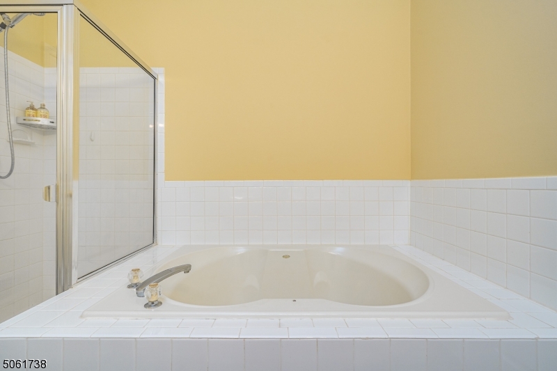 47 Battalion Drive Bernards, NJ 07920 - Photo 14 of 24 a bathroom with a bathtub