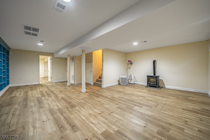 47 Battalion Drive Bernards, NJ 07920 - Photo 19 of 24 a view of a livingroom with a staircase