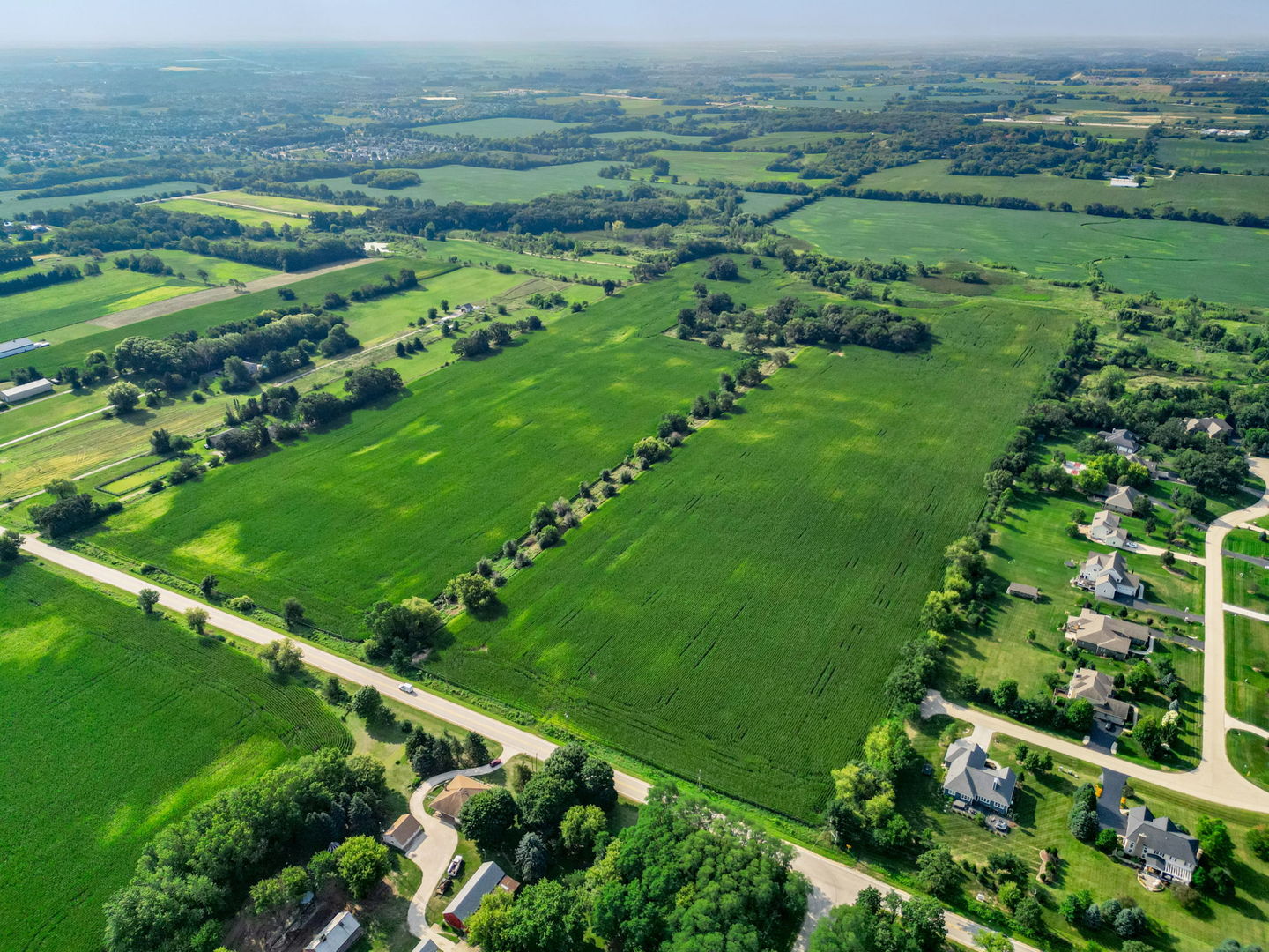 a view of a green field with lots of green space