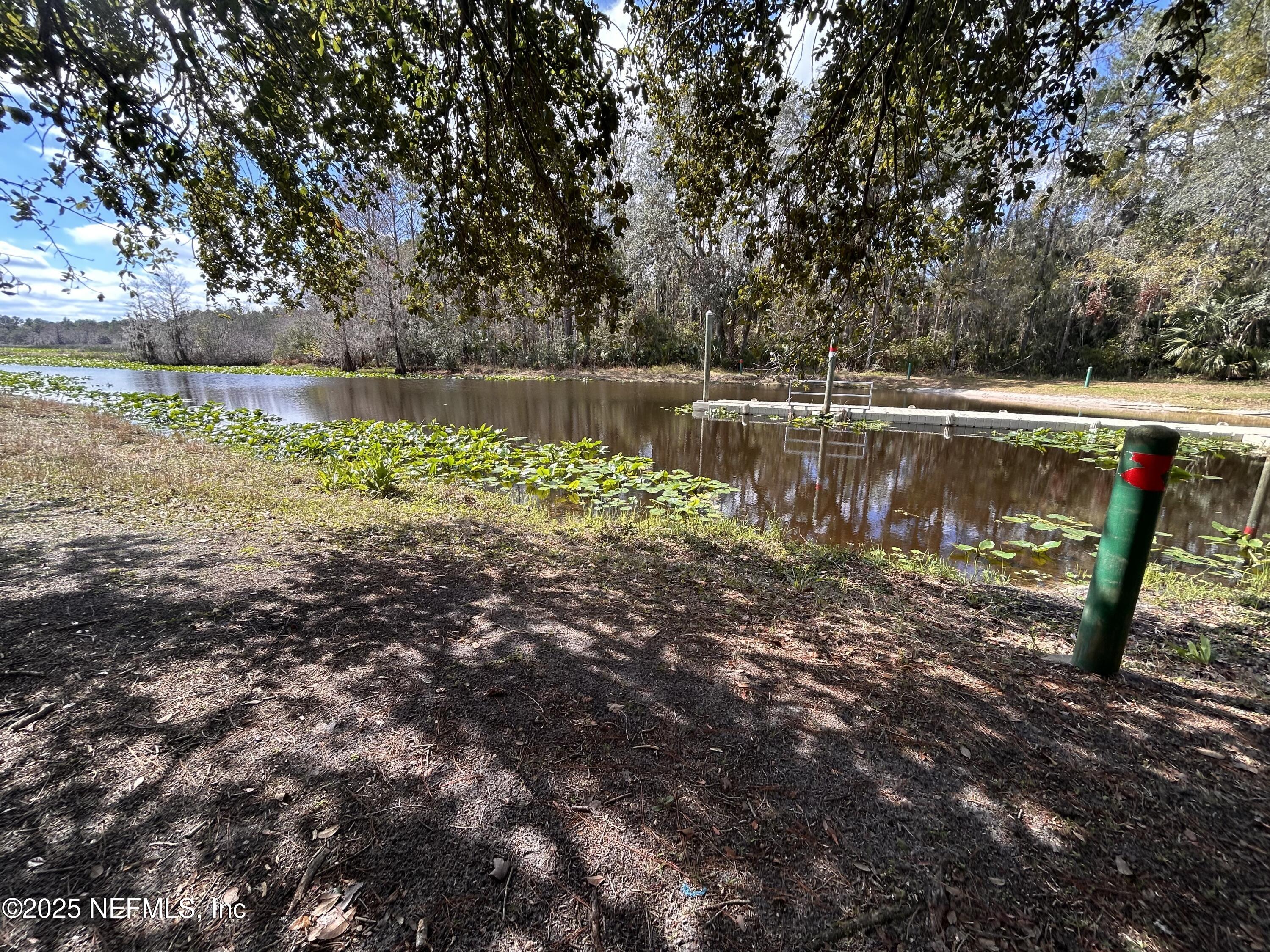 100 Kenwood Boat Ramp Road Interlachen, FL 32148 - Photo 11 of 19 a view of lake with a barn