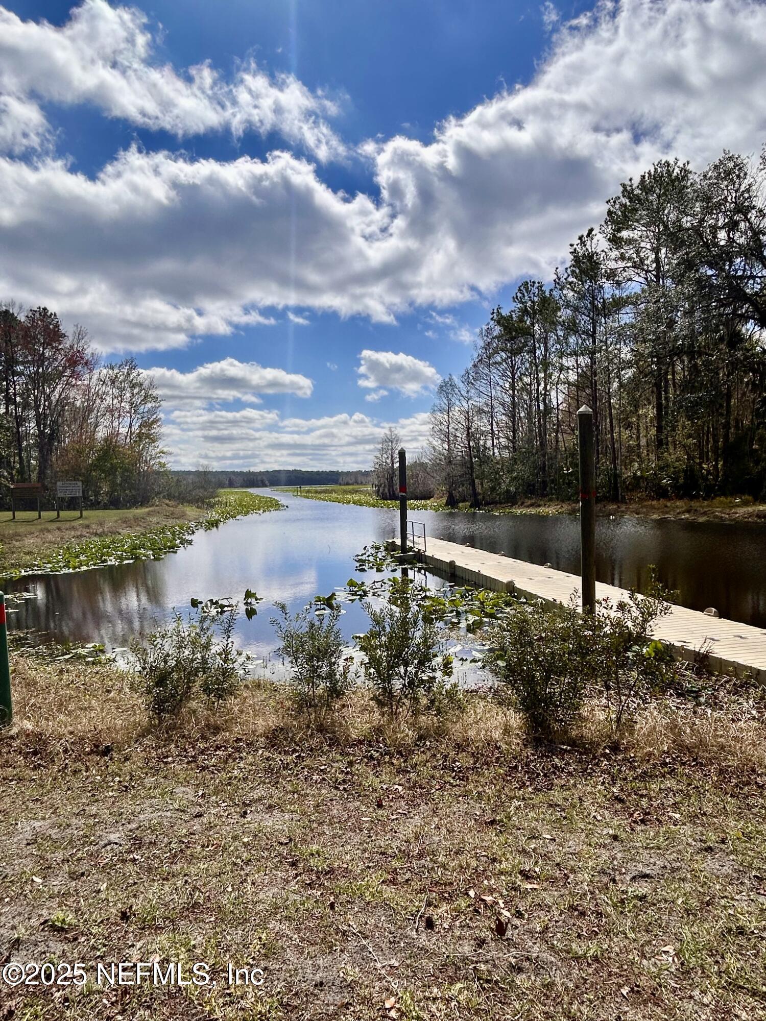 100 Kenwood Boat Ramp Road Interlachen, FL 32148 - Photo 13 of 19 a view of a lake with a big yard