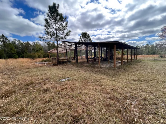 a view of a garden with an outdoor space