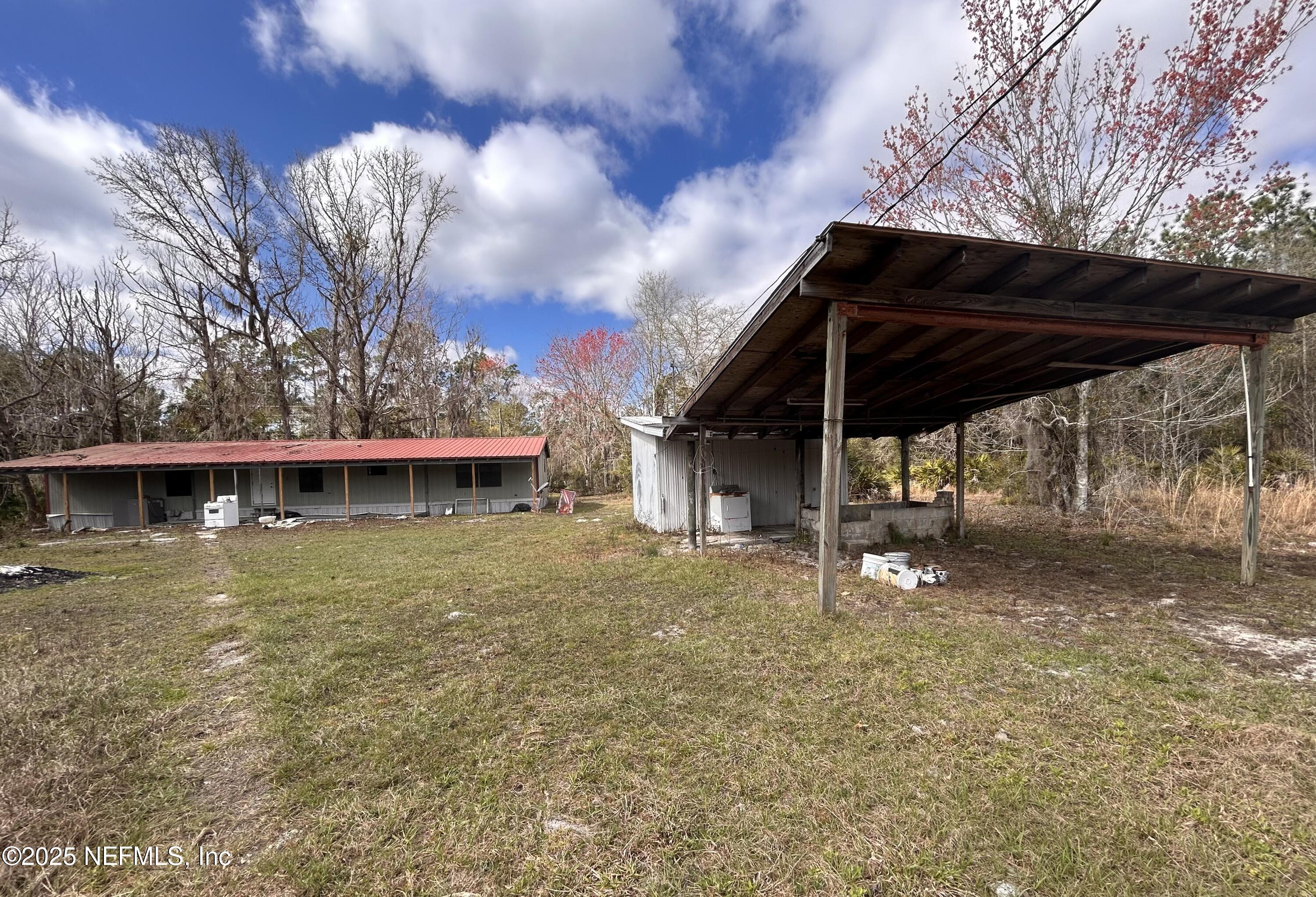 100 Kenwood Boat Ramp Road Interlachen, FL 32148 - Photo 9 of 19 a view of a house with backyard