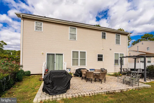 a view of a house with patio