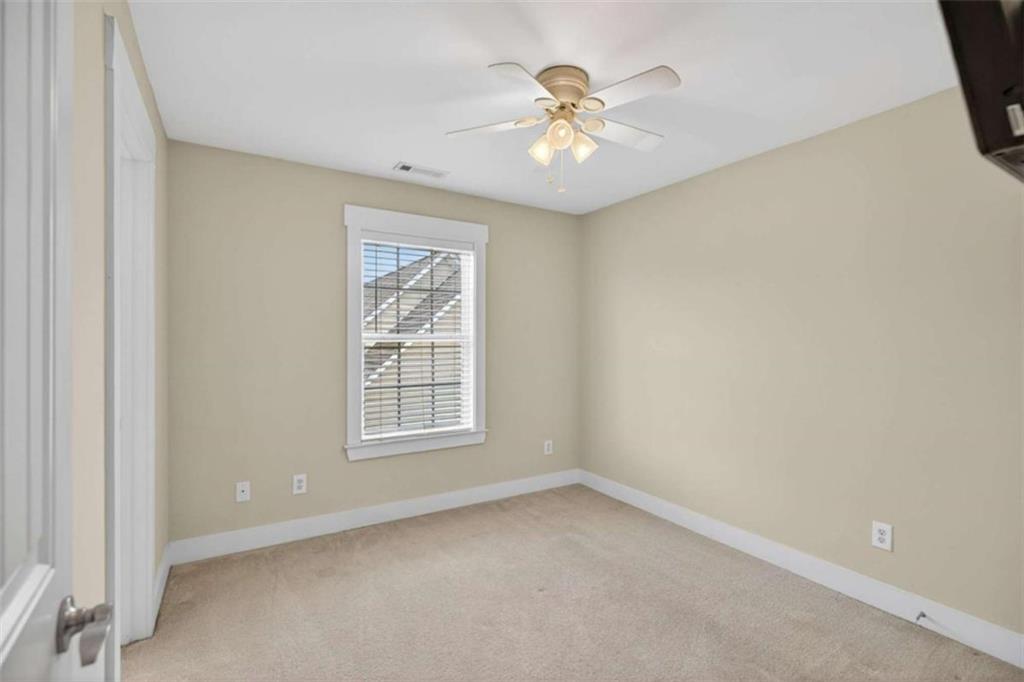 507 Rippling Court Temple, GA 30179 - Photo 16 of 31 an empty room with a window