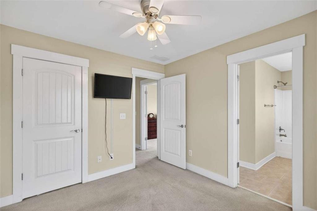 507 Rippling Court Temple, GA 30179 - Photo 19 of 31 a view of a livingroom with a chandelier fan
