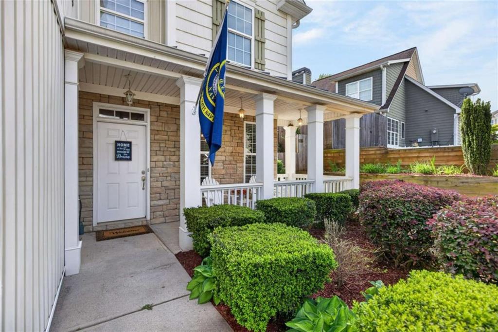 507 Rippling Court Temple, GA 30179 - Photo 2 of 31 a front view of a house with garden