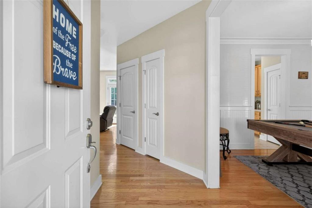 507 Rippling Court Temple, GA 30179 - Photo 3 of 31 a view of a hallway with wooden floor and entryway