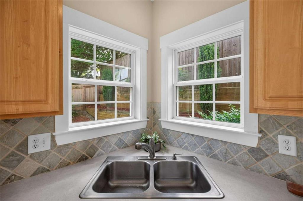 507 Rippling Court Temple, GA 30179 - Photo 9 of 31 a view of a sink and a window in a kitchen